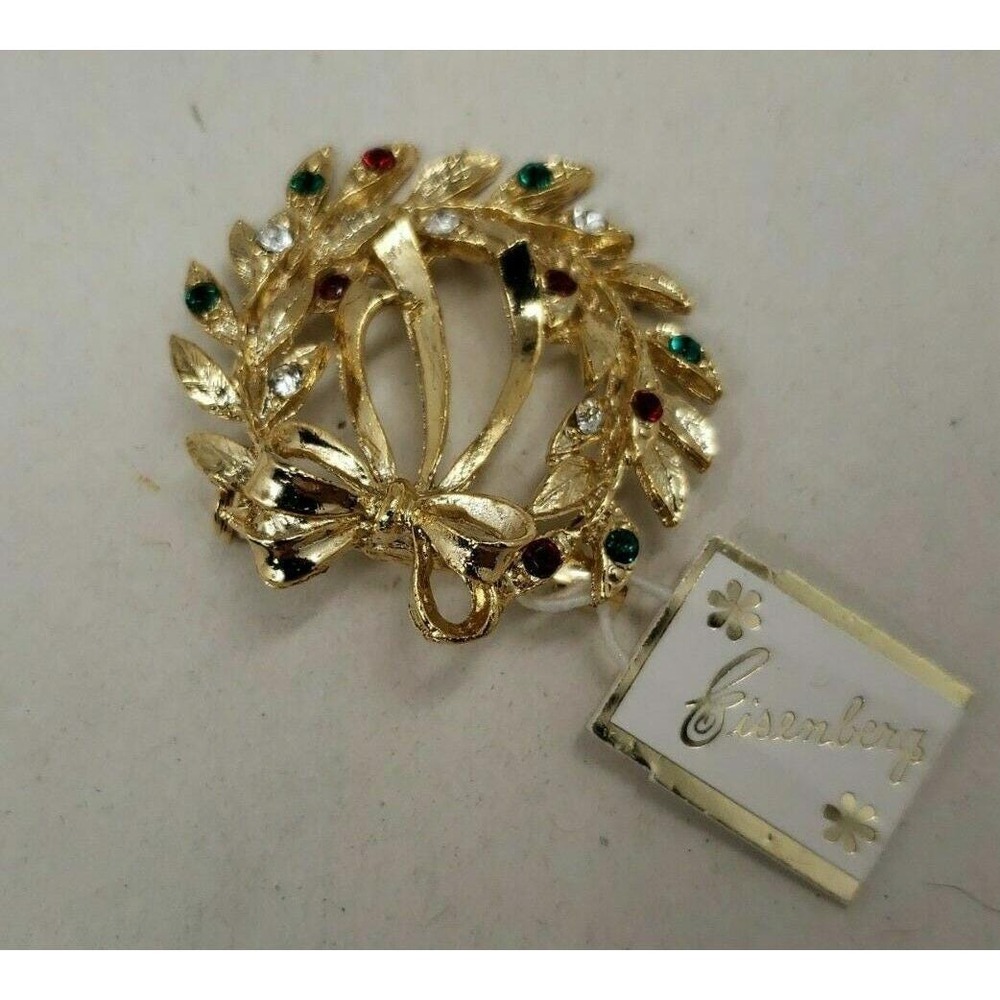 Vintage new Eisenberg gold tone holiday Christmas wreath rhinestone brooch pin